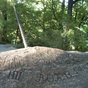 Poland, Warsaw, Lazienki Park, on a rock