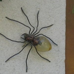 Wandlampe in Form einer Spinne