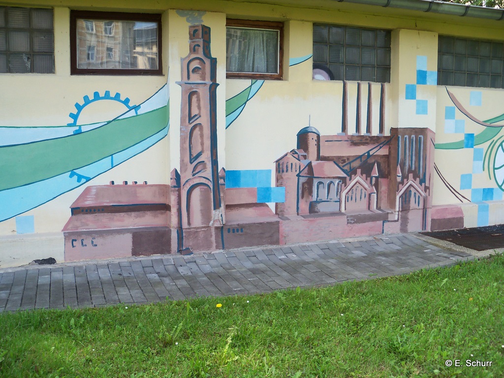 Gesamtansicht des ehemaligen Kraftwerks Mitte auf einem DREWAG-Graffiti