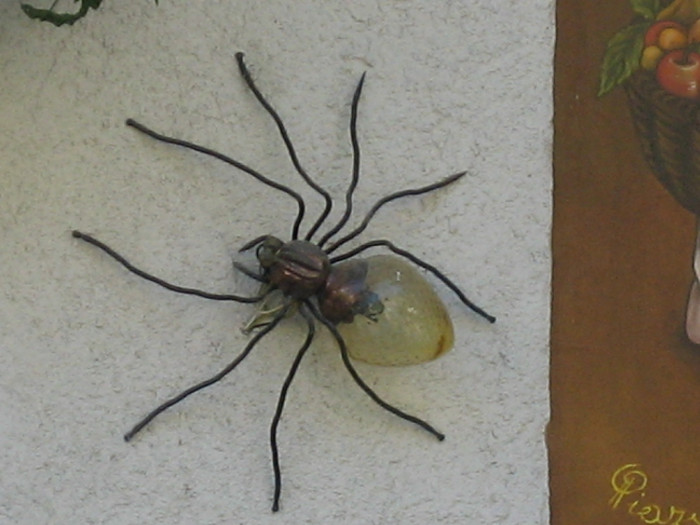 Wandlampe in Form einer Spinne
